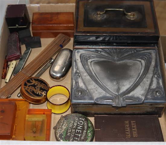 A collection of boxes, tortoiseshell scent bottle, box fan etc.